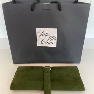 Saks Fifth Avenue vintage green suede leather jewelry roll.